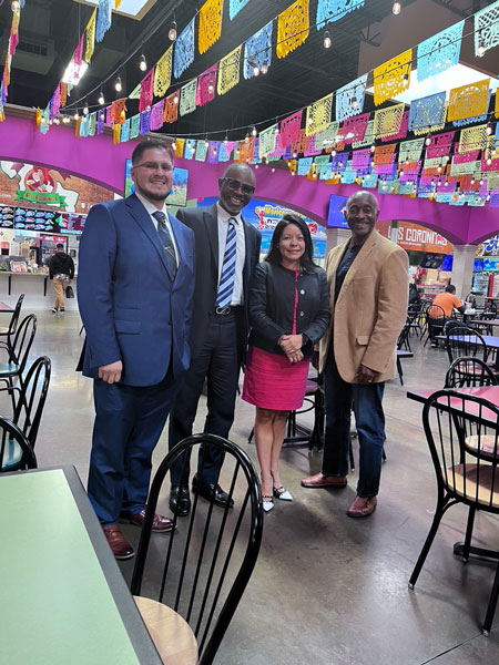 Gwinnett County Young Democrat chairman Jorge Granados and Edafe Sodje, chairman of NAPAC-Nigerian American Political Affairs Committee, Gwinnett County Democratic Party Chairperson Brenda Lopez, and Ray Harvin